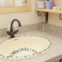 可愛らしいお花をあしらった陶製の洗面ボウルを採用。奥様の好みにぴったり。